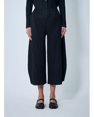 Pleats Please Issey Miyake Cropped Pleated Trousers - Blue