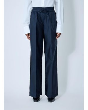 Prada Logo Plaque Trousers - Blue