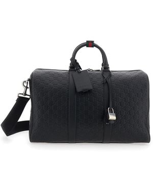 Gucci 'Emblem' Suitcase With Adjustable And Removable Shoulder Strap And All-Over Embossed Gg Motif - Black