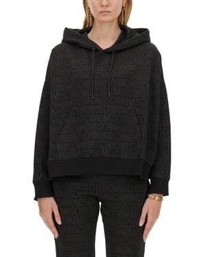 Moschino Sweatshirt With All Over Logo - Black