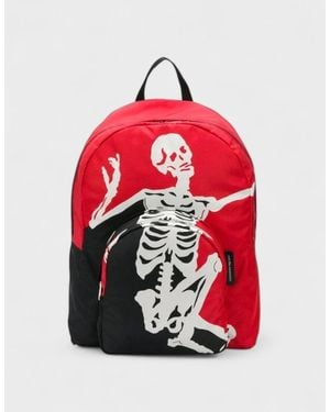 McQueen Skeleton Print Backpack - Red