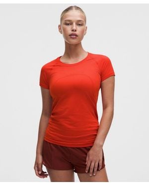 lululemon – Swiftly Tech Short-Sleeve Shirt 2.4 Hip Length – – Size 4 - Red