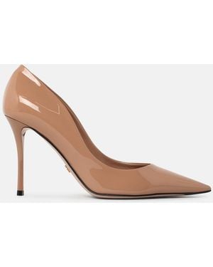Dolce & Gabbana Patent Pumps - White