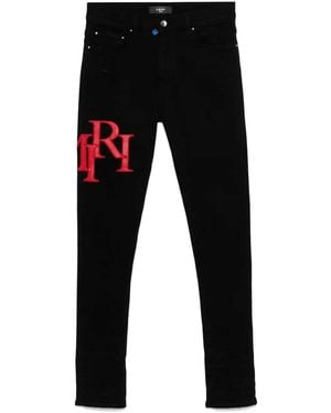 Amiri Skinny Jeans With Offset Logo - Black
