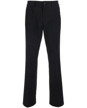 Amiri Pants With Logo Embroidery On The Back And Flared Leg - Black