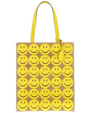 【関税込み】moschino SMILEY' SHOPPING BAG Moschino Smiley Bag in Yellow | Lyst