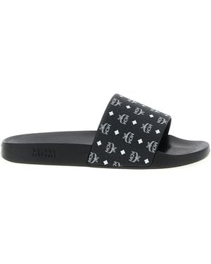 MCM Logo Slides - Black