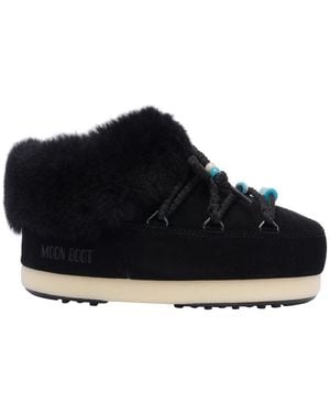 サンダル・ミュール MOON BOOT BEADS MULES MOON BOOT EVX beaded shearling mules | NET-A-PORTER
