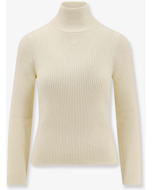 Celine Ribbed Stretch Wool Turtleneck Sweater - White