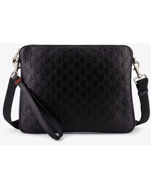 Gucci Leather Gg Emblem Crossbody Bag With Embossed Gg Motif - Black