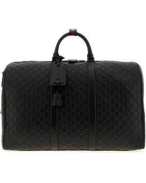 Gucci Leather Gg Emblem Duffle Bag - Black
