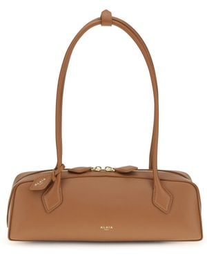 Alaïa Alaïa Small Le Teckel Shoulder Bag - White