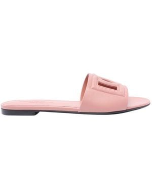 サンダル・ミュール Dolce&Gabbana POLISHED CALFSKIN SLIDE SANDALS WITH DG LOGO Calfskin sliders with DG logo in Brown for Women