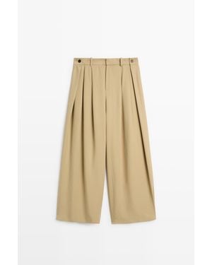 MASSIMO DUTTI Soepelvallende Broek Met Plooien En Knoopdetail - Naturel