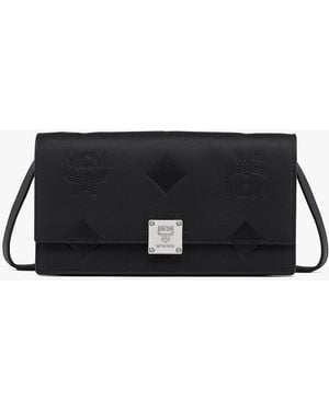 MCM Aren Chain Wallet In Embossed Monogram Leather - Black