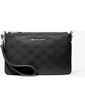 Michael Kors Bolso de pulsera Jet Set Travel pequeño transformable de nailon tejido con logotipo - Gris