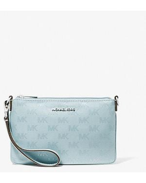 Michael Kors Outlet Mk Jet Set Travel Small Woven Logo Nylon Convertible Wristlet - Blue