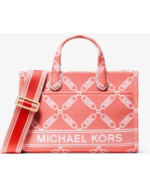 Michael Kors Borsa messenger Gigi piccola con logo jacquard Empire - Rosa