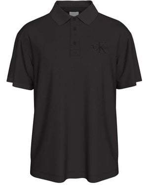 Calvin Klein Tops ,Zwart ,Katoen Easy Monologo Casual Polo