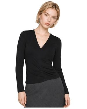 Kocca Overhemden ,Zwart ,Leer Fitted Top Met Lange Mouwen En Een Gedrapeerde Zijkant