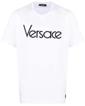Versace T-shirt e polo bianche con ricamo del logo - Bianco