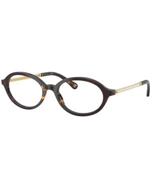 CHANEL Glasses - Metallic