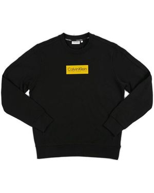 Calvin Klein Gelbes Logo Sweatshirt Für Lässigen Stil - Schwarz