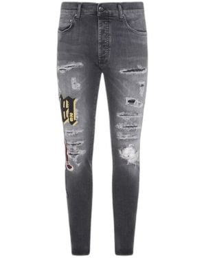 Amiri Varsity Patch Skinny Jeans - Grau