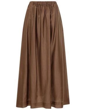 LE SULLY STUDIO Maxi Skirts - Marrón