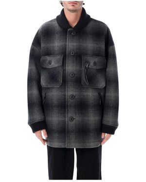 and wander Winter Jackets - Black