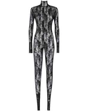 Norma Kamali Jumpsuits & Playsuits ,Zwart ,Leer Lange Mouw Slim Fit Turtle Catsuit Met Voetjes