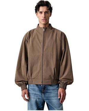 Rains Light Jackets - Marrone
