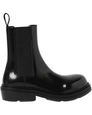 ショートブーツ・ブーティ BOTTEGA VENETA Flat ankle boots 763873 V1NY1 7665 BOTTEGA VENETA: Snap ankle boots in suede - Black | Bottega