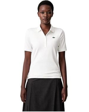 Lacoste Tops ,Wit ,Polyester Slim Fit Uv Protect Stretch Golf Polo