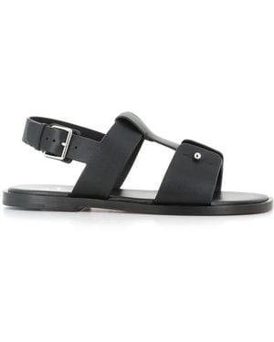 Christian Louboutin Schwarze Ledersandale Mit Silbernem Pin