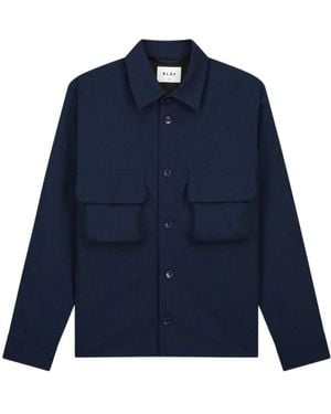 OLAF HUSSEIN Light Jackets - Blue