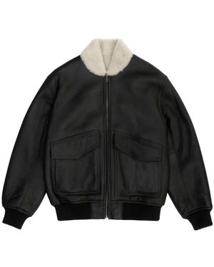 Just things we like Jassen ,Bruin ,Leer Hoshi Reversible Shearling Jacket - Zwart