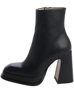 Souliers Martinez Heeled Boots - Black