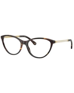 CHANEL Glasses - Metallic