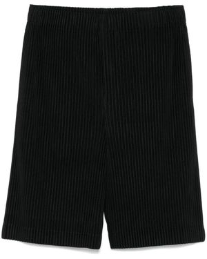 Issey Miyake Pantaloni eleganti per uomo e donna - Nero