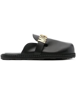 Moschino Sandali neri piatti con dettaglio cinturino - Nero
