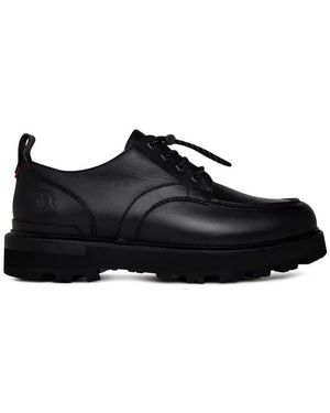 Moncler Schwarze derby-schuhe mit logo