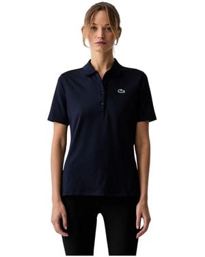 Lacoste Tops ,Blauw ,Polyester Slim Fit Uv Protect Stretch Golf Polo - Zwart
