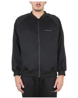 ih nom uh nit Light Jackets - Black