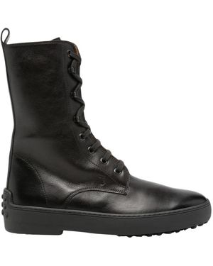 Tod's Schoenen ,Zwart ,Platte Schoenen - Bruin