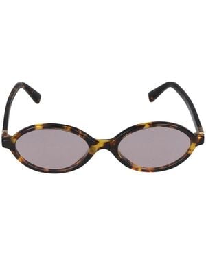 Miu Miu Stijlvolle Zonnebril Met Uniek Ontwerp - Bruin