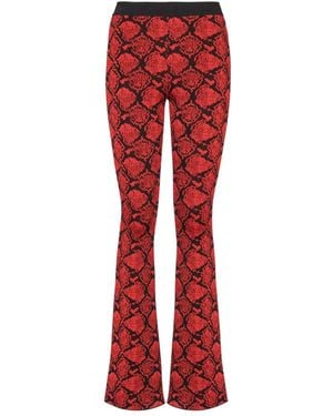 Balmain Pantalones De Punto Bootcut Con Jacquard De Pitón, Mujer, Talla - Rojo