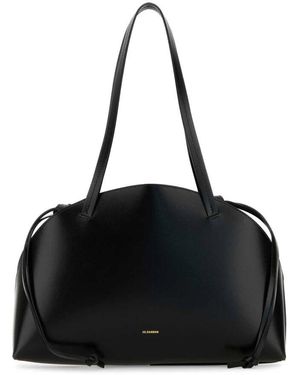 Jil Sander Schwarze curve shoulder handtasche