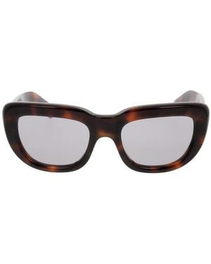 Prada Zonnebrillen - Bruin