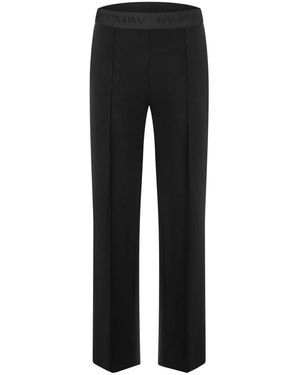 Cambio Pantalones negros elegantes con banda de cintura bordada